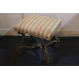 A 19th century style French gilt carved wood upholstered stool, the scrolling legs with acanthus