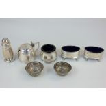 A George V silver cruet, makers Duncan & Scobbie, Birmingham 1933, together with two pairs of silver