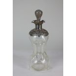 An Edward VII silver mounted waisted decanter, maker's mark worn, Birmingham 1909, the silver