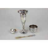 A silver bud vase (a/f), an Indian white metal bowl, a Swiss 800 silver mounted cork by Jezler,