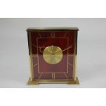 A Jaeger-LeCoultre eight day mantel clock with square brass case and imitation tortoiseshell dial,
