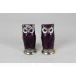 A pair of Norwegian silver gilt and purple enamel owl peppers by David Andersen, marked D A