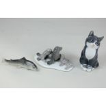 Two Royal Copenhagen porcelain models of a black and white cat, 14cm, and a fish, 11.5cm long,