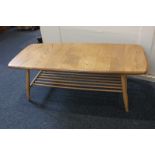 An Ercol light elm coffee table, 105cm by 46cm