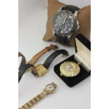 A lady's 9ct gold Rotary watch, three gold plated watches, and a gentleman's Guess watch