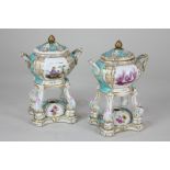 A pair of 19th century Berlin porcelain pot pourri, each oval two handled pot decorated with figural