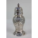 A Victorian silver sugar caster, makers Wakely & Wheeler, London 1897, with embossed floral swag and