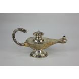 A George V silver table lighter in the form of an oil lamp, with bird head finial handle, maker