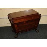 A Regency mahogany cellaret, the inlaid rectangular top with canted corners and brass lion mask