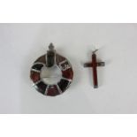A Scottish silver mounted hardstone plaid brooch, and a hardstone cross