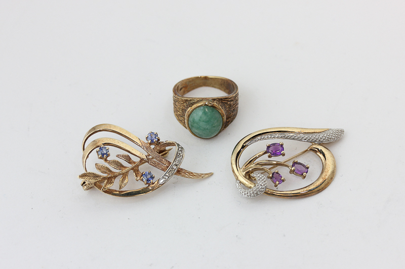 Two 9ct gold and gem set brooches, and a 9ct gold and hardstone ring