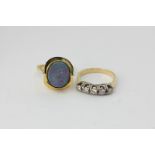 A diamond five-stone ring and an 18ct gold and opal ring