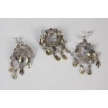 A Norwegian silver filigree brooch and earring set by Ivar T. Holth, marked sterling Norway