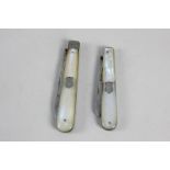 Two George V silver and mother of pearl fruit knives, makers John Yeomans Cowlishaw, Sheffield 1916,