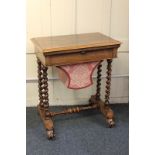 A Victorian rosewood sewing / work table with rectangular top and drawer with fitted interior