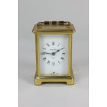 A Bayard brass carriage clock, with white dial and Roman numerals, inscribed Bayard, 8 Days, 14cm