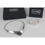 A silver necklace and matching bangle by Iain David Young, London 1998, in Jean Muir boxes