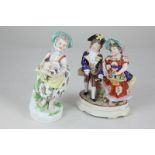 A Vienna porcelain figure of a shepherdess, 19cm, together with a Sitzendorf porcelain figure