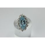 An aquamarine and diamond cluster ring