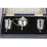 A George V cased silver cruet set of salt, pepper and mustard, maker Gomms, Birmingham 1933, 3.5oz