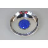 A Norwegian 830 silver dish by Ottar Hval, with central blue enamel design of a ship, the base