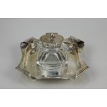 A Victorian / Edwardian matched silver mounted cut glass inkwell in desk stand, maker John