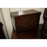 An 18th century oak deed box, with carved design, 43cm by 23cm