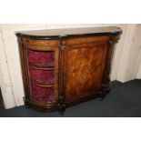 A Victorian gilt metal mounted and walnut inlaid credenza, centred with a cupboard decorated with