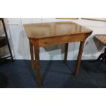 A burr walnut table on carved chamfered legs, 75.5cm by 53cm