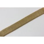 An 18ct gold mesh bracelet, 80.6g