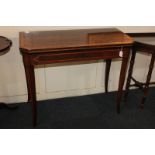 A 19th century inlaid rosewood card table, rectangular cut corner fold-over top with satinwood