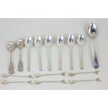 A George III silver teaspoon, maker John Lias, London 1809, a set of six silver coffee spoons, a set
