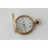 A 9ct gold hunter cased pocket watch, signed Thomas Russell