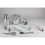 A Harrods silver plated cocktail shaker, an ice bucket, a pair of sauce ladles, a soup ladle, a