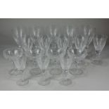 A collection of Stuart crystal drinking glasses decorated with fern fronds, comprising five large
