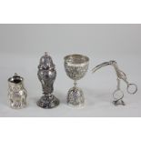 An imported silver Toby jug, an imported silver pepper, an Indian white metal measure, and a pair of