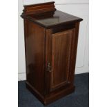 An Edwardian Maple & Co inlaid mahogany pot cupboard with single panel door enclosing two shelves,