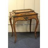 A 19th century crossbanded walnut veneered and gilt metal mounted jardiniere with rectangular convex