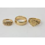 An 18ct gold signet ring, two other 18ct gold rings, 23.7g