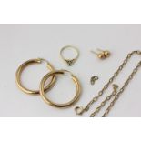 A diamond single stone ring in 18ct gold, a pair of 9ct gold hoop earrings, a bracelet, and ear