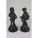 A pair of 19th century Boyer bronze figures of putti, one gathering grapes, the other wheat, on
