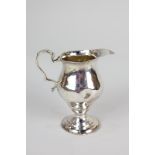 A George III silver helmet cream jug, marks worn, London 1781 (a/f)