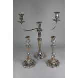 A silver plated three-sconce candelabra, together with a pair of acanthus leaf embossed