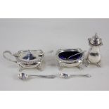 An Elizabeth II silver cruet set, makers Cooper Brothers & Sons Ltd, Sheffield 1957, with matching