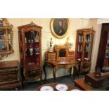 A pair of Vernis Martin style rosewood gilt metal mounted vitrines, the arched tops with pierced