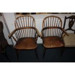 A near pair of 19th century Windsor armchairs