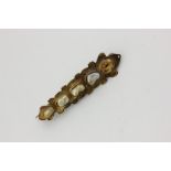 A citrine and freshwater pearl bar brooch, probably Scottish