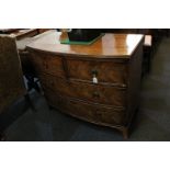 A 19th century mahogany bow front chest of two short over two long drawers with brass drop ring