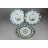 A pair of Mintons porcelain armorial plates retailed by Apsley Pellatt & Co, decorated with the