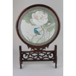 A Chinese glazed screen with circular silk embroidered two-sided panel of a kingfisher and butterfly